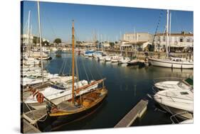 Yachts moored at the Quai de Bernonville in this north coast town, Saint Martin de Re, Ile de Re, C-Robert Francis-Stretched Canvas