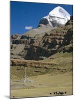 Yak Train Approaches Tarboche, Tibet, China-Anthony Waltham-Mounted Photographic Print