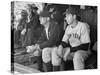 Yankee Great Joe Dimaggio Sitting in Dugout, Watching Game. Yankees Vs. Brooklyn Dodgers-Carl Mydans-Stretched Canvas