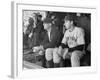 Yankee Great Joe Dimaggio Sitting in Dugout, Watching Game. Yankees Vs. Brooklyn Dodgers-Carl Mydans-Framed Premium Photographic Print