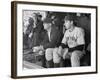 Yankee Great Joe Dimaggio Sitting in Dugout, Watching Game. Yankees Vs. Brooklyn Dodgers-Carl Mydans-Framed Premium Photographic Print