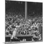 Yankee Mickey Mantle in Action, Swinging Bat with Catcher and Umpire Behind Him-Grey Villet-Mounted Premium Photographic Print