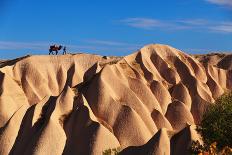 Camel and the Cameleer on the Rock and Tuff Formations of Cappadocia Which Creates Very Nice Patter-Yavuz Sariyildiz-Photographic Print