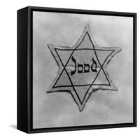 Yellow and Black Star Which the Jews Were Required to Wear in Occupied Holland During World War 2-null-Framed Stretched Canvas