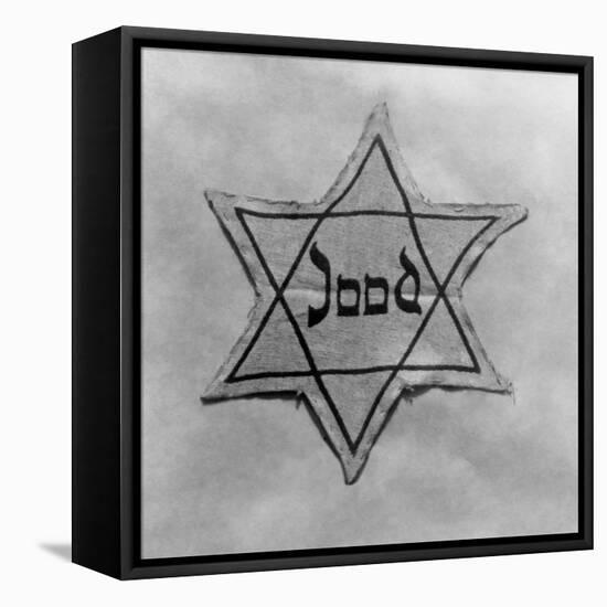 Yellow and Black Star Which the Jews Were Required to Wear in Occupied Holland During World War 2-null-Framed Stretched Canvas