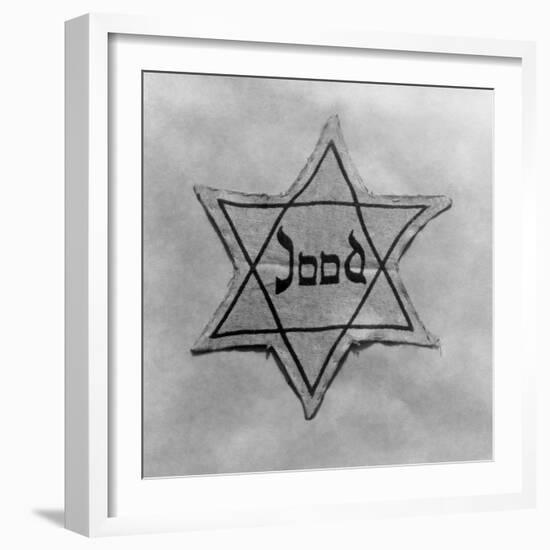 Yellow and Black Star Which the Jews Were Required to Wear in Occupied Holland During World War 2-null-Framed Photo