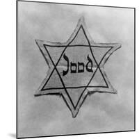 Yellow and Black Star Which the Jews Were Required to Wear in Occupied Holland During World War 2-null-Mounted Photo