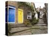 Yellow and Blue Doors on Houses in the Opening, Robin Hood's Bay, England-Pearl Bucknall-Stretched Canvas