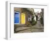 Yellow and Blue Doors on Houses in the Opening, Robin Hood's Bay, England-Pearl Bucknall-Framed Photographic Print