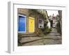 Yellow and Blue Doors on Houses in the Opening, Robin Hood's Bay, England-Pearl Bucknall-Framed Photographic Print