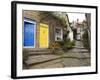 Yellow and Blue Doors on Houses in the Opening, Robin Hood's Bay, England-Pearl Bucknall-Framed Photographic Print