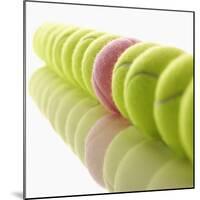 Yellow and Pink Tennis Balls-null-Mounted Photographic Print