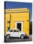 Yellow building and white VW bug, Oaxaca, Mexico, North America-Melissa Kuhnell-Stretched Canvas