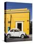 Yellow building and white VW bug, Oaxaca, Mexico, North America-Melissa Kuhnell-Stretched Canvas