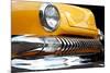 Yellow Car Grill & Headlight-null-Mounted Art Print