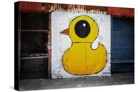 Yellow Duck on Brick Wall in Brooklyn NY-null-Stretched Canvas