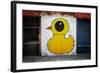 Yellow Duck on Brick Wall in Brooklyn NY-null-Framed Photo