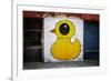 Yellow Duck on Brick Wall in Brooklyn NY-null-Framed Photo