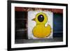 Yellow Duck on Brick Wall in Brooklyn NY-null-Framed Photo