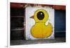 Yellow Duck on Brick Wall in Brooklyn NY-null-Framed Photo