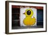 Yellow Duck on Brick Wall in Brooklyn NY-null-Framed Photo