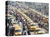 Yellow Kolkata Taxis and Commuters at Howrah Railway Station, Howrah, Kolkata (Calcutta), India-Annie Owen-Stretched Canvas
