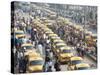 Yellow Kolkata Taxis and Commuters at Howrah Railway Station, Howrah, Kolkata (Calcutta), India-Annie Owen-Stretched Canvas