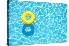 Yellow Pool Float, Ring Floating in a Refreshing Blue Swimming Pool-StacieStauffSmith Photos-Stretched Canvas