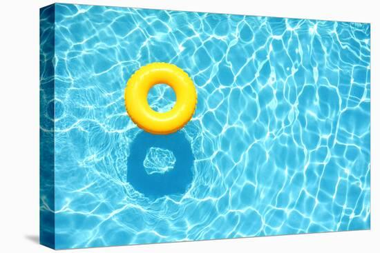 Yellow Pool Float, Ring Floating in a Refreshing Blue Swimming Pool-StacieStauffSmith Photos-Stretched Canvas