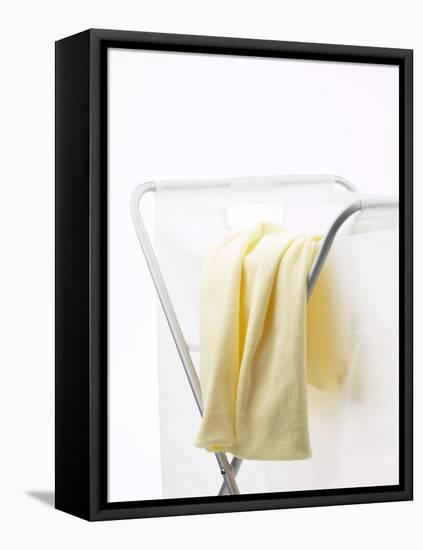 Yellow T-Shirt on Laundry Hamper-null-Framed Stretched Canvas