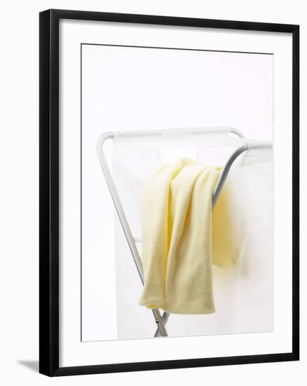 Yellow T-Shirt on Laundry Hamper-null-Framed Photographic Print