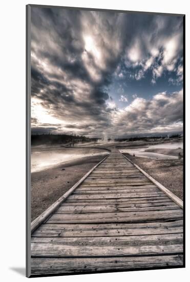 Yellowstone, Wyoming: a Wooden Path Going Through Norris Geyser Basin on a Cloudy Sunset-Brad Beck-Mounted Photographic Print