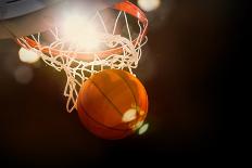 Basketball Going through the Basket at a Sports Arena (Intentional Spotlight)-yobro-Photographic Print