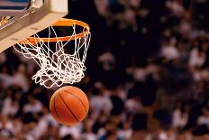 Basketball Going through the Basket at a Sports Arena (Intentional Spotlight)-yobro-Photographic Print