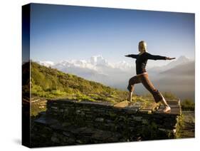 Yoga  in the Morning Sun Upon Poon Hill Along the  Anapurna Circuit - Ghorepani, Nepal-Dan Holz-Stretched Canvas
