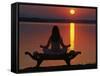 Yoga on a Saddle Bench Watching the Sun Go Down across the Zambesi River, Zambia-John Warburton-lee-Framed Stretched Canvas