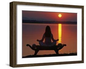 Yoga on a Saddle Bench Watching the Sun Go Down across the Zambesi River, Zambia-John Warburton-lee-Framed Photographic Print