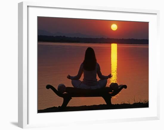 Yoga on a Saddle Bench Watching the Sun Go Down across the Zambesi River, Zambia-John Warburton-lee-Framed Photographic Print