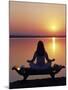 Yoga on a Saddle Bench Watching the Sun Go Down across the Zambesi River, Zambia-John Warburton-lee-Mounted Photographic Print