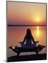 Yoga on a Saddle Bench Watching the Sun Go Down across the Zambesi River, Zambia-John Warburton-lee-Mounted Photographic Print