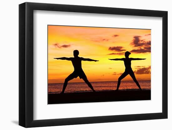 Yoga People Training and Meditating in Warrior Pose Outside by Beach at Sunrise or Sunset-Maridav-Framed Premium Photographic Print