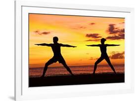 Yoga People Training and Meditating in Warrior Pose Outside by Beach at Sunrise or Sunset-Maridav-Framed Photographic Print