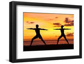 Yoga People Training and Meditating in Warrior Pose Outside by Beach at Sunrise or Sunset-Maridav-Framed Photographic Print