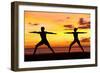 Yoga People Training and Meditating in Warrior Pose Outside by Beach at Sunrise or Sunset-Maridav-Framed Photographic Print