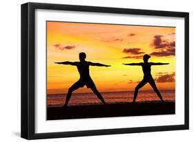 Yoga People Training and Meditating in Warrior Pose Outside by Beach at Sunrise or Sunset-Maridav-Framed Photographic Print