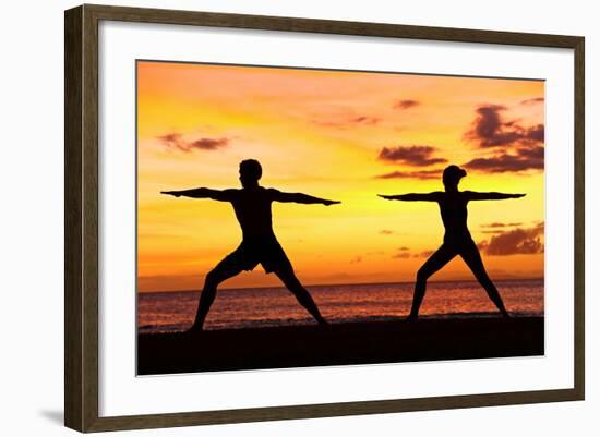 Yoga People Training and Meditating in Warrior Pose Outside by Beach at Sunrise or Sunset-Maridav-Framed Photographic Print