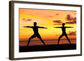 Yoga People Training and Meditating in Warrior Pose Outside by Beach at Sunrise or Sunset-Maridav-Framed Photographic Print