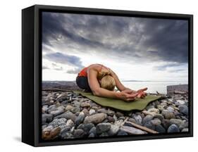 Yoga Position of Child's Pose in Lincoln Park - West Seattle, Washington-Dan Holz-Framed Stretched Canvas