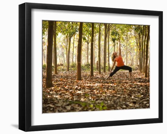 Yoga Practice Among a Rubber Tree Plantation in Chiang Dao, Thaialand-Dan Holz-Framed Photographic Print