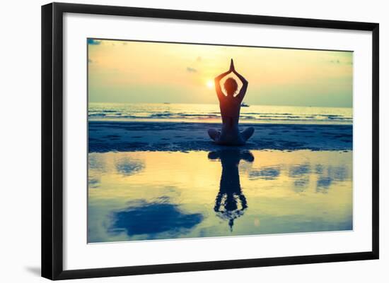 Yoga Woman Sitting In Lotus Pose On The Beach During Sunset-De Visu-Framed Art Print